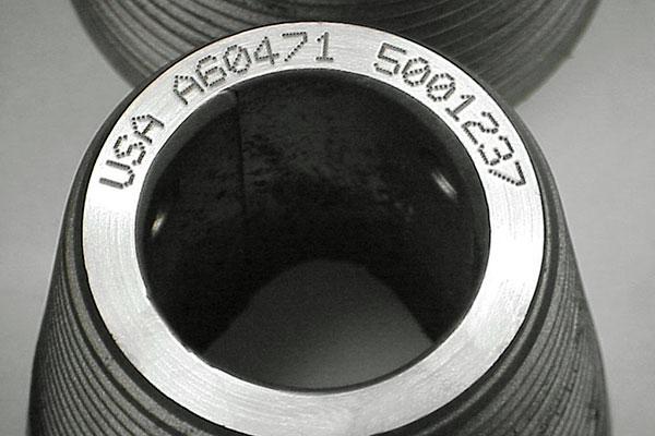 Permanent dot peen marking of couplings and sucker rod couplings