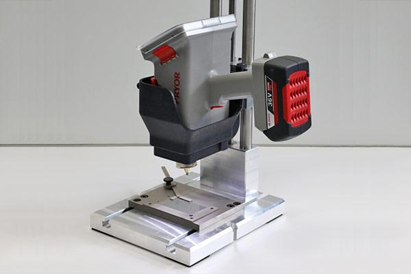 Handheld machine mounted for precision desktop marking