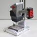 Handheld machine mounted for precision desktop marking